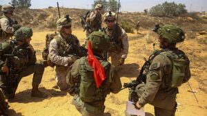 ZEELIM TRAINING FACILITY, Israel - U.S. Marines with Battalion Landing Team, 1st Battalion, 6th Marine Regiment, 22nd Marine Expeditionary Unit coordinate with members of the Israel Defense Force July 18 during Noble Shirley 16, a bilateral training exercise between the militaries. 22nd MEU, deployed with the Wasp Amphibious Ready Group, is conducting naval operations in the U.S. 6th fleet area of operations in support of U.S. national security interests in Europe. 